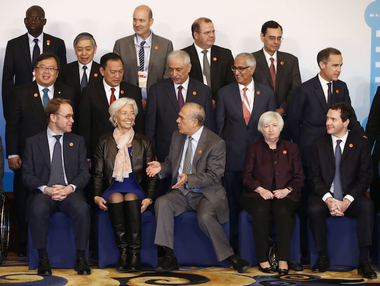 Officials take their positions for a family photo of G20 Finance Ministers and Central Bank Governors Meeting at the Pudong Shangri-la Hotel in Shanghai, China, 27 February 2016. 