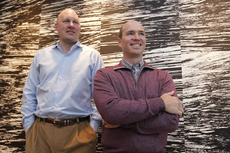 Marc Andreessen, left, and his longtime business partner, Ben Horowitz, pose in the office of their venture capital firm, Andreessen Horowitz, in Menlo Park, California.