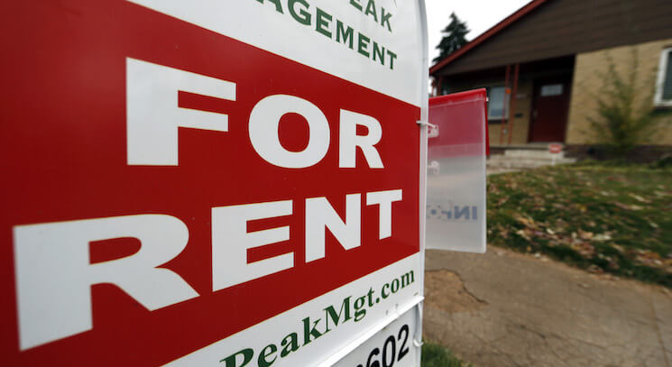 A rental sign is seen outside a property in Denver. 