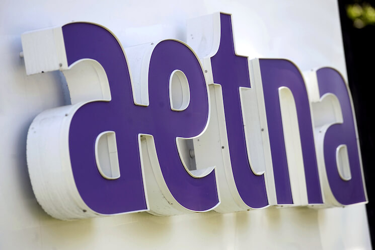 Signage in front of Aetna Inc.’s headquarters in in Hartford, Conn.