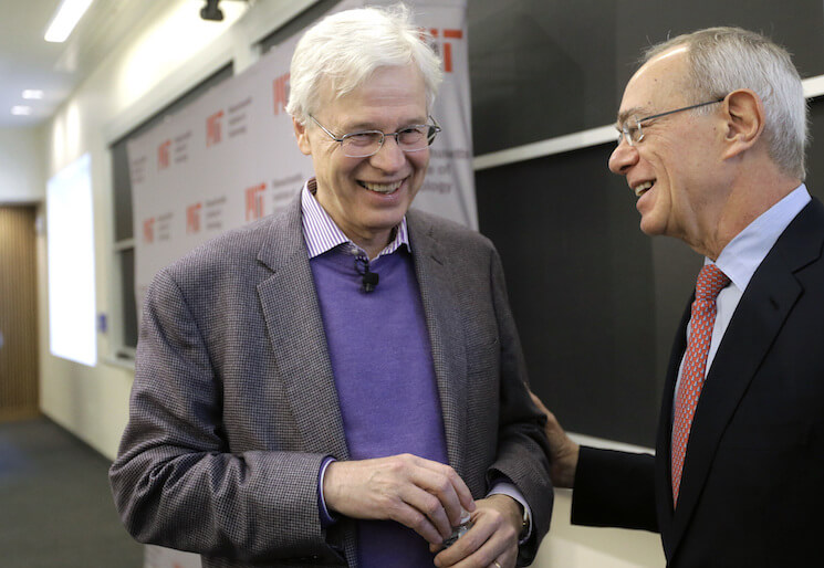 Finnish Professor Bengt Holmstrom, of the Massachusetts Institute of Technology, left, smiles while speaking with MIT President L. Rafael Reif following a news conference, Monday, Oct. 10, 2016, on the campus of MIT in Cambridge, Mass. The Nobel Memorial Prize in economic sciences was awarded Monday to Oliver Hart and Holmstrom, who will share the prize. The Nobel jury praised the winners "for their contributions to contract theory." 