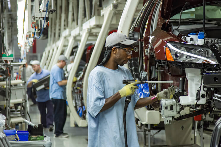 Workers assemble Volkswagen Passat sedans at the automaker's plant in Chattanooga, Tenn. 