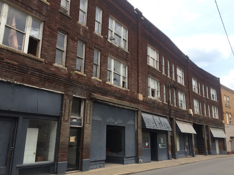 Shuttered storefronts in downtown Logan, W.Va. 