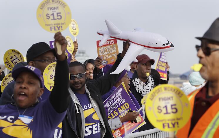 SEIU Local 1 union members protest for an increase in the minimum wage late last year at the Detroit Metropolitan Airport in Romulus, Mich.