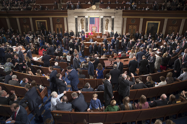 Members of the House of Representatives gather in the chamber last month (AP Photo/J. Scott Applewhite).