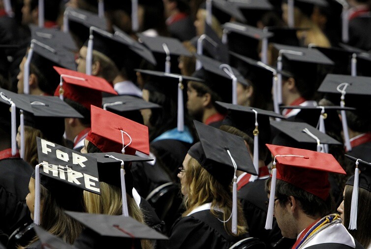 Students attend graduation ceremonies at the University of Alabama in Tuscaloosa, Ala. 