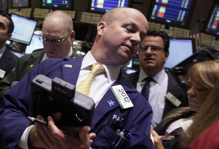 Traders works on the floor of the New York Stock Exchange. 