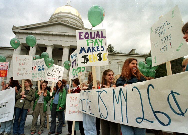 People gather for a rally on Equal Pay Day in Montpelier, Vermont in 1999.