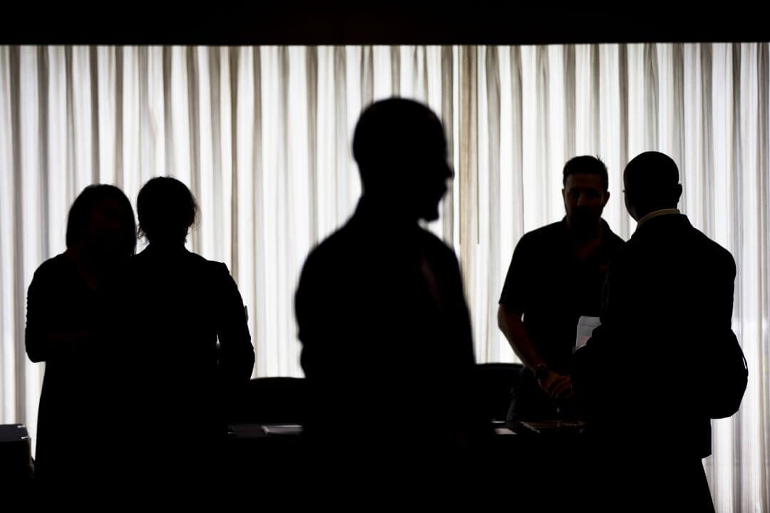 Job seekers and recruiters meet during a job fair in Philadelphia, June 2014. 