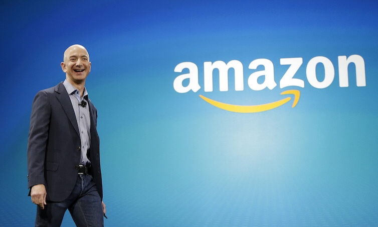 Amazon.com Inc. CEO Jeff Bezos walks onstage for the launch of the new Amazon Fire Phone in Seattle. 