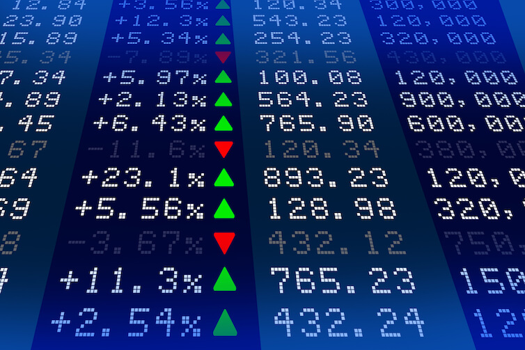 A stock exchange display. Despite a currently booming stock market, benefits may not flow directly to most Americans.