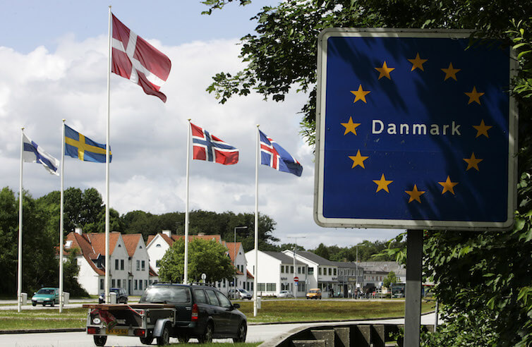 A car crosses the border into Denmark. A new working paper looks at the effect of a Danish wealth tax on wealth accumulation and inequality.