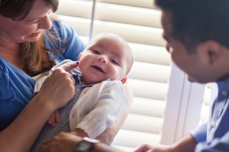 Couple with their newborn son, by Andy Dean, veer.com
