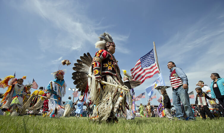 Members of the Standing Rock Sioux Tribal Nation dance during a Cannon Ball flag day celebration in North Dakota. Research presented at the Freedom & Justice Conference in June highlights the difficulty in studying Native Americans due to a lack of high-quality data.