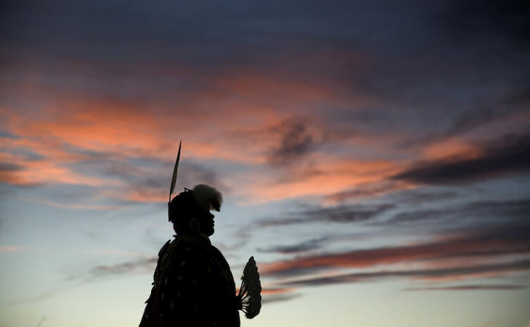 A woman performs a traditional Native American dance on the Blackfeet Indian Reservation in Browning, Montana.