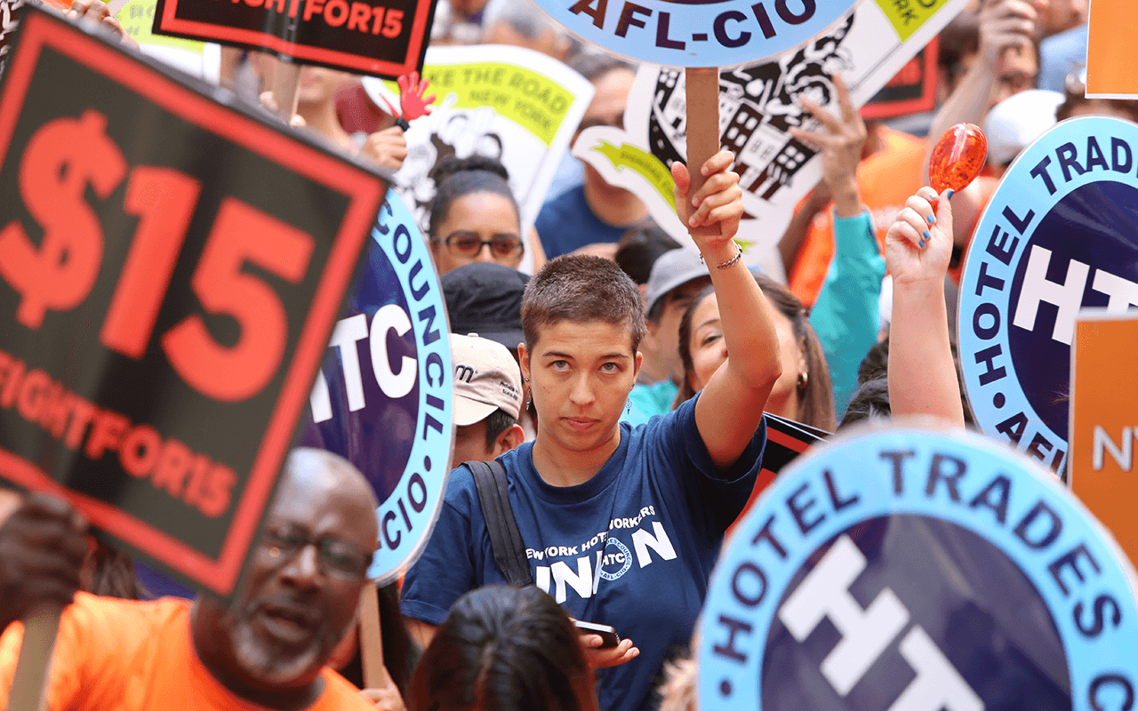 NEW YORK CITY - JULY 12, 2015: Organized labor, fast food workers, and elected officials gathered on Barclay St. to celebrate the NY wage board's recommendation for a $15/hr minimum wage statewide by 2021.