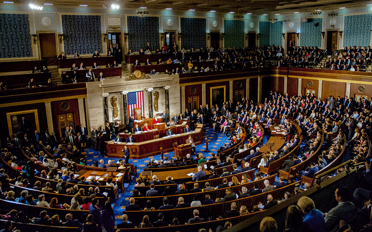 Washington, DC., USA, January 3, 2017 Members of the 115th Congress and their families mingle on the House floor.