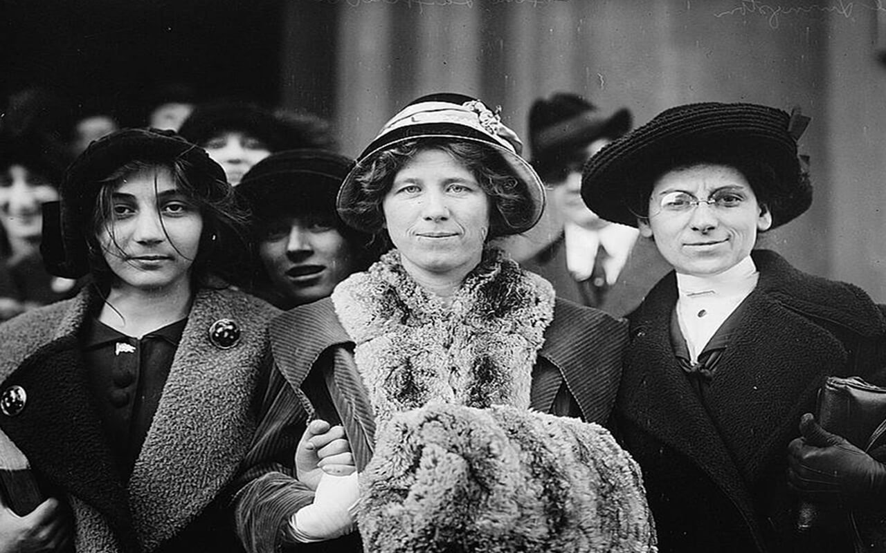 Suffrage and labor activist Flora Dodge "Fola" La Follette (1882-1970), social reformer and missionary Rose Livingston, and a young striker during a garment strike in New York City in 1913.