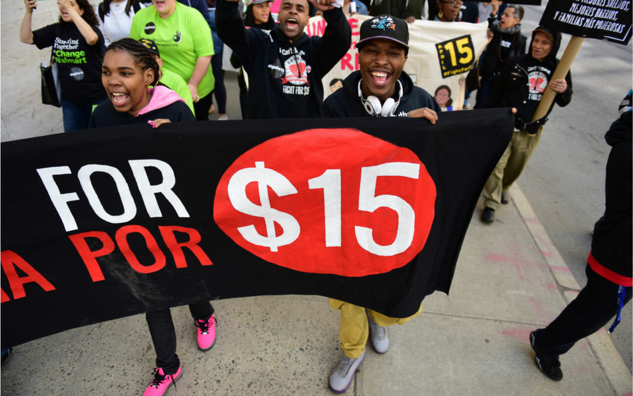 NEW YORK CITY – APRIL 15 2015: High school students, union activists, and fast food workers marched in Manhattan’s Upper West Side to demand a $15 per hour federal minimum wage.