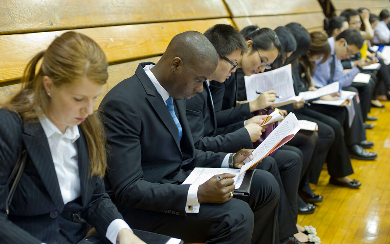 Job seekers attend a job fair in New York, September 2012.